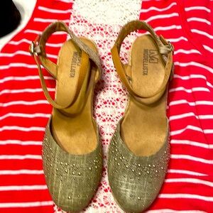 Cute strappy sandals with gold embellishments on the rounded toes